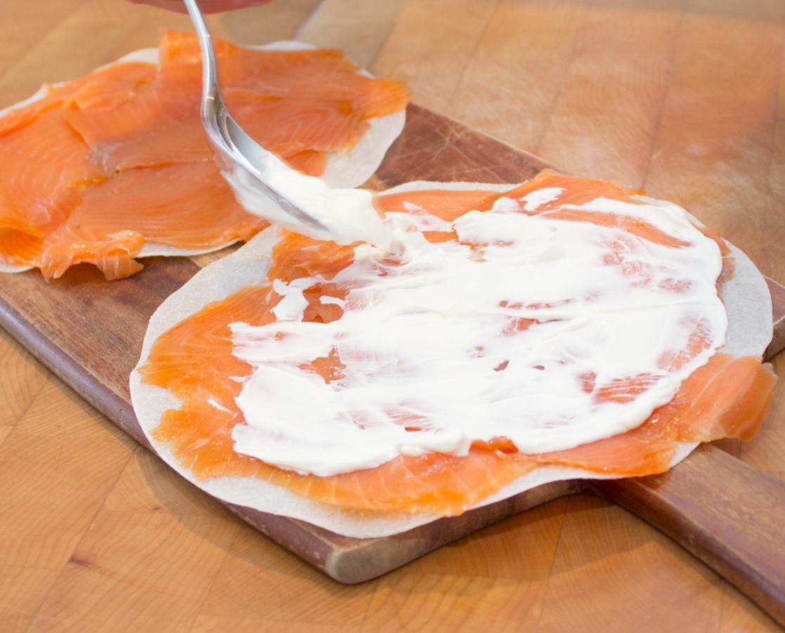 Smoked salmon carpaccio on crispy rice paper with blood orange salsa