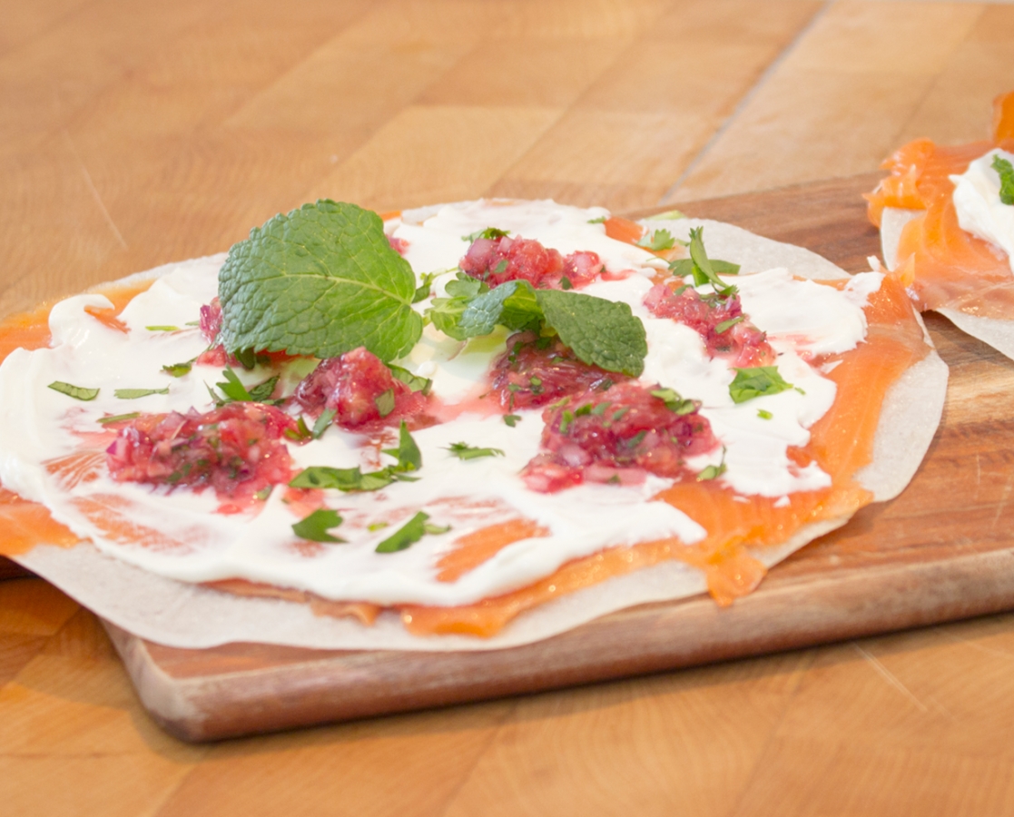 Smoked salmon carpaccio on crispy rice paper with blood orange salsa