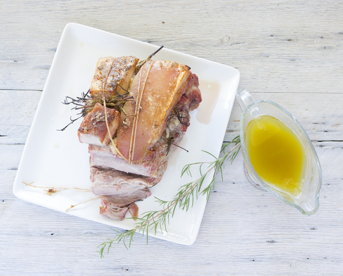 Slow roasted Piglet in white wine, rosemary and garlic