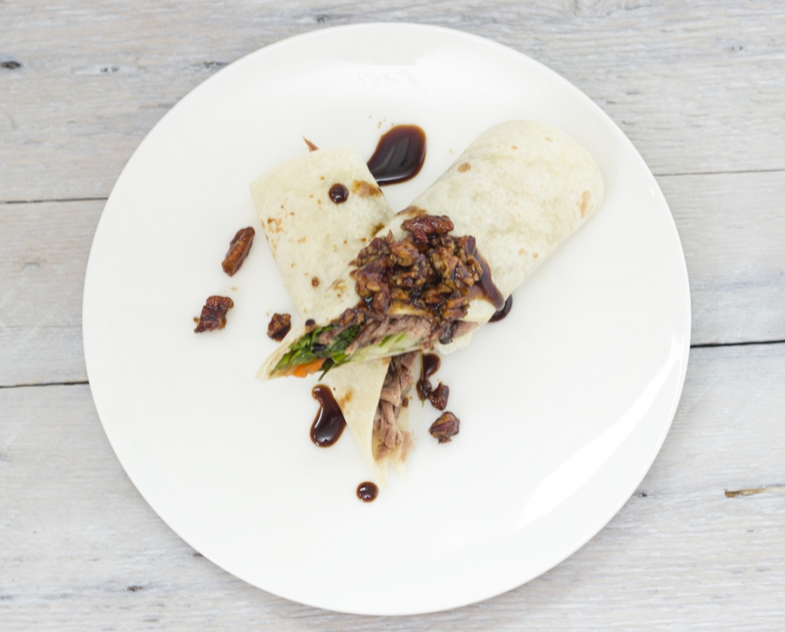 Duck confit crêpes with caramelized Balsamumm Pecan butter sauce