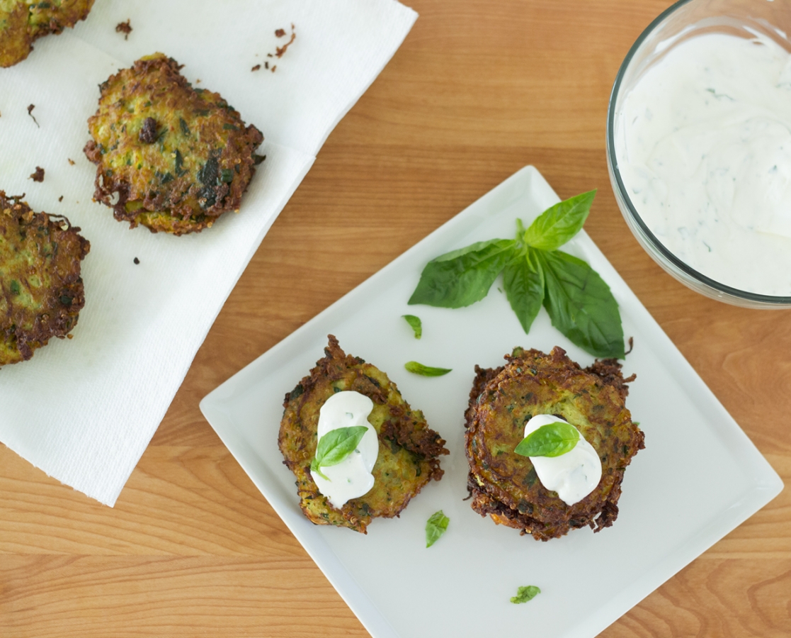 Spaghetti squash, quinoa, spinach and parmesan fritters topped with basil sour cream