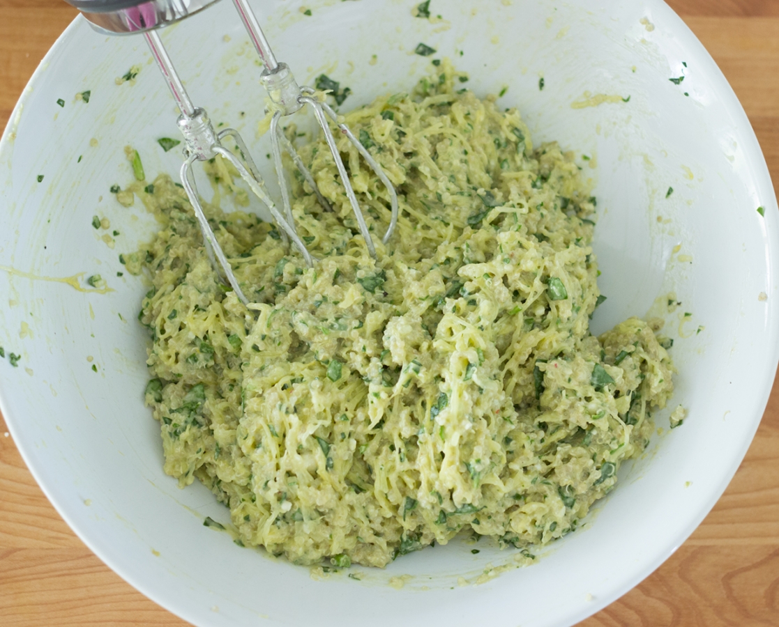 Spaghetti squash, quinoa, spinach and parmesan fritters topped with basil sour cream