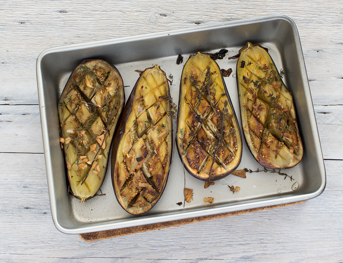 Eggplant patties topped with Balsamumm pickled cucumbers, radishes, and green apple