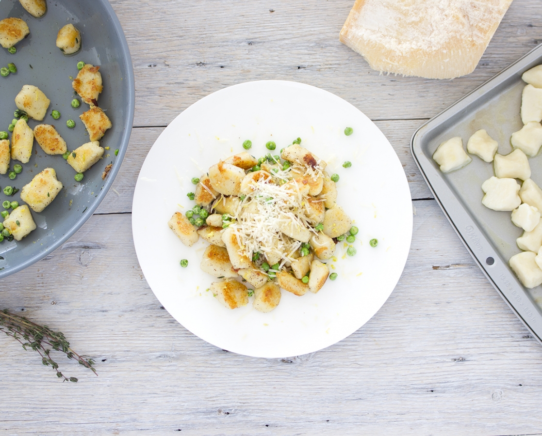 Pane seared Potato Gnocchi with lemon butter and green peas