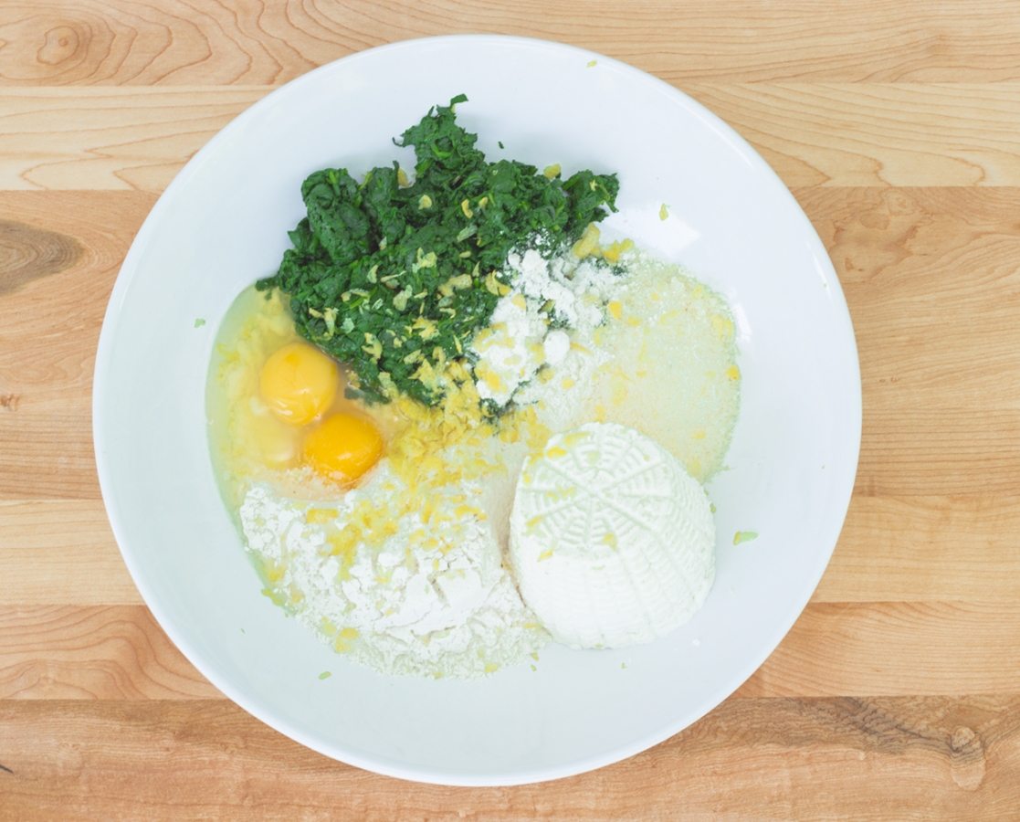 Gluten-free spinach ricotta gnocchi with garlic and fresh Basil confit cherry tomatoes