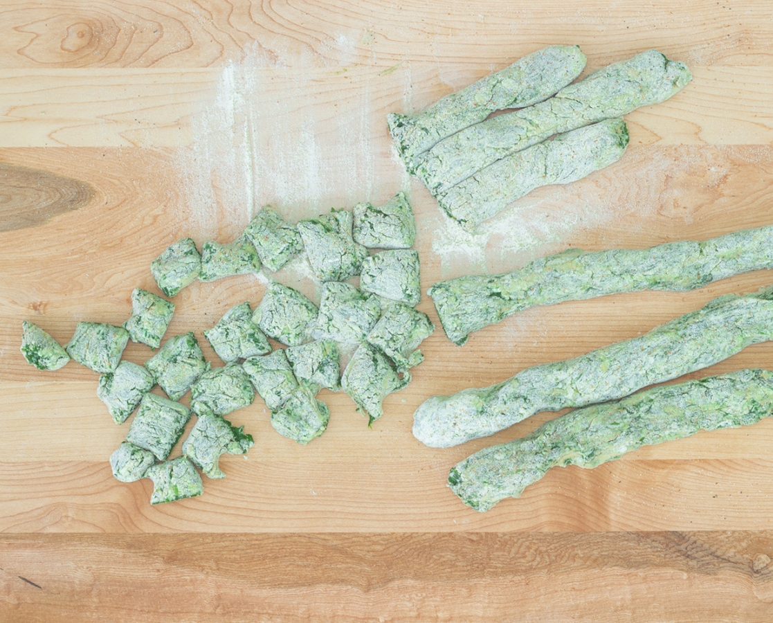 Gluten-free spinach ricotta gnocchi with garlic and fresh Basil confit cherry tomatoes