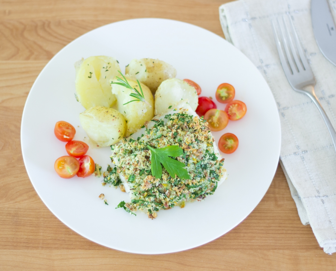 Boiled potatoes with olive oil and fresh rosemary