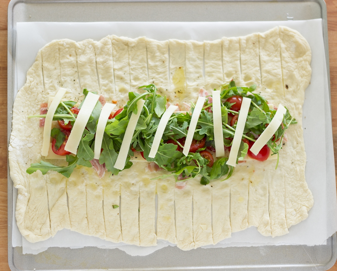 Calzones aux tomates cerises et à la pancetta rehaussées de Balsamumm