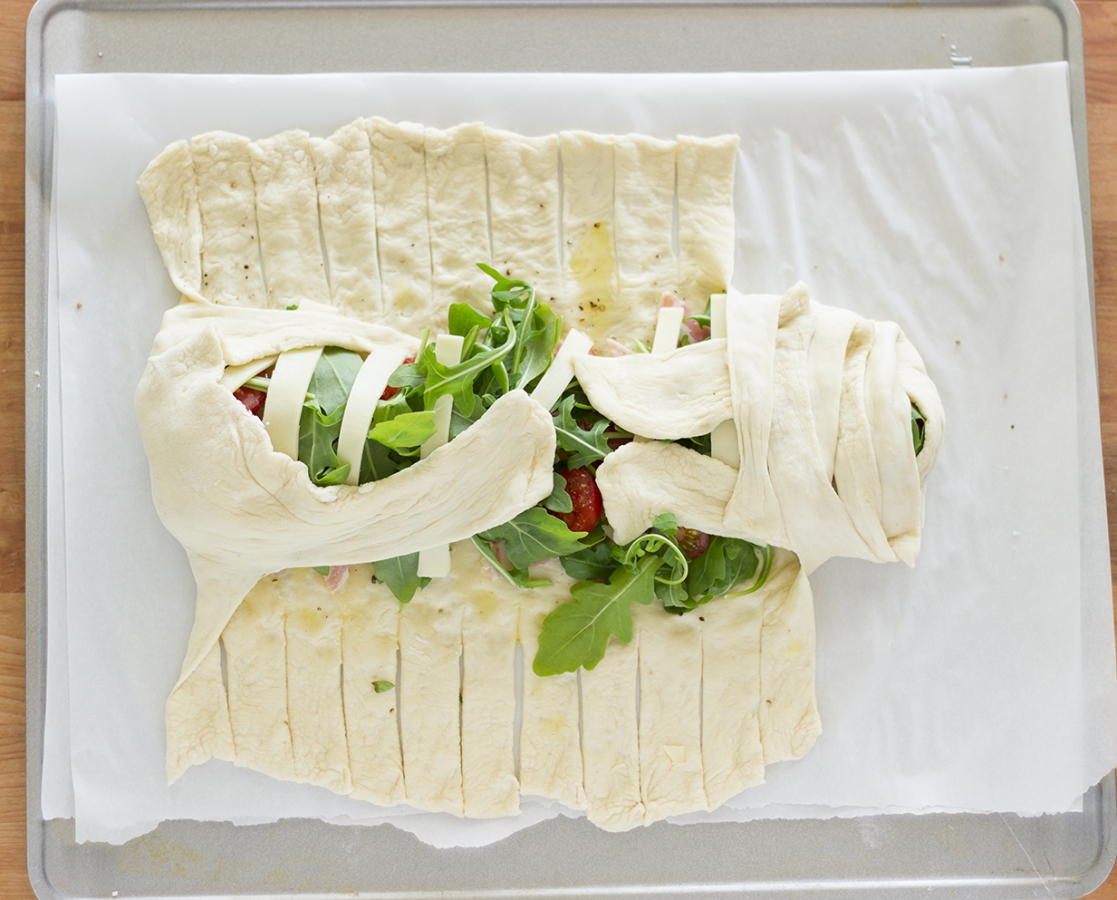 Cherry tomato-pancetta calzone with Balsamumm drizzle