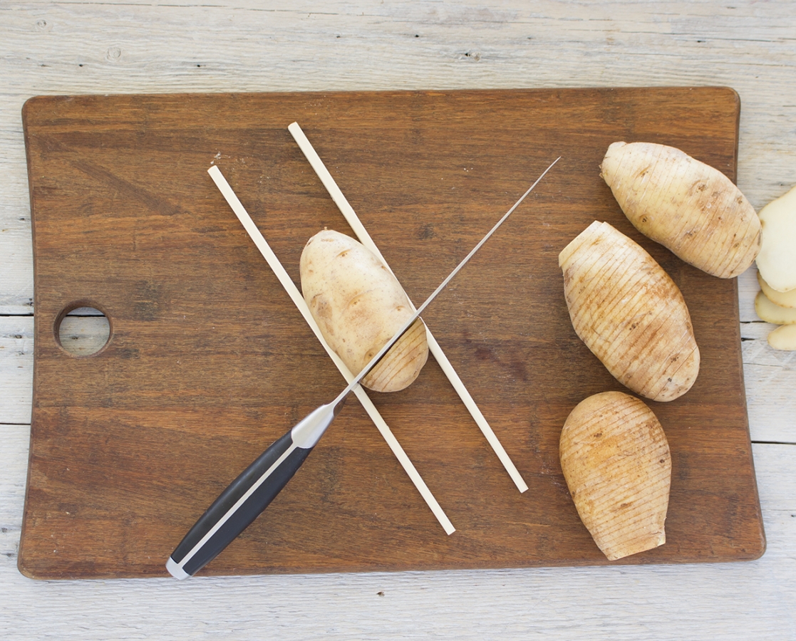 Hasselback potato with garlic-rosemary infused olive oil-butter and Parmesan