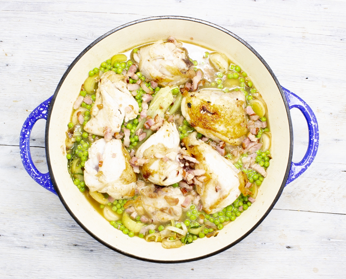 Chicken in a creamy Bacon-leek sauce with romaine lettuce and green Peas