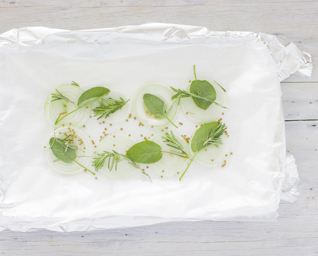 Saumon en papillote avec des citrons caramélisés et sa sauce hollandaise