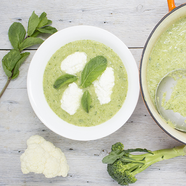 Cauliflower, broccoli & fresh mint soup topped with ricotta cheese