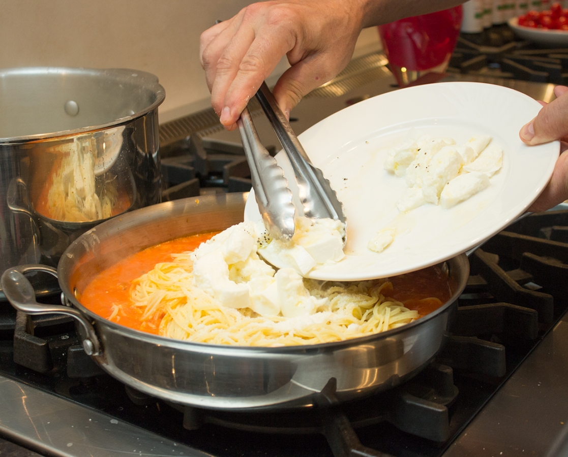 Spaghetti alla checca slow roasted cherry tomato sauce & fresh mozzarella di bufala