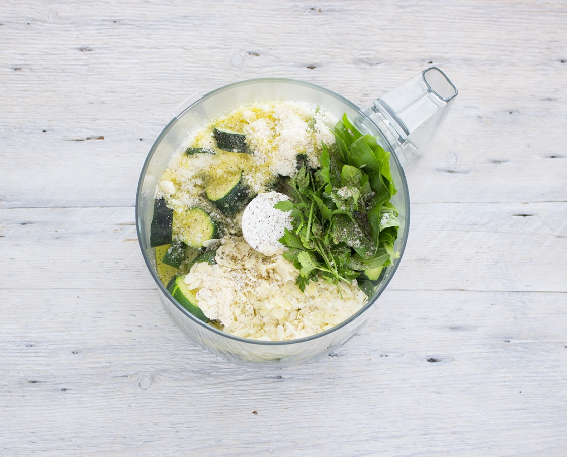 Spaghetti on zucchini, basil and almond pesto