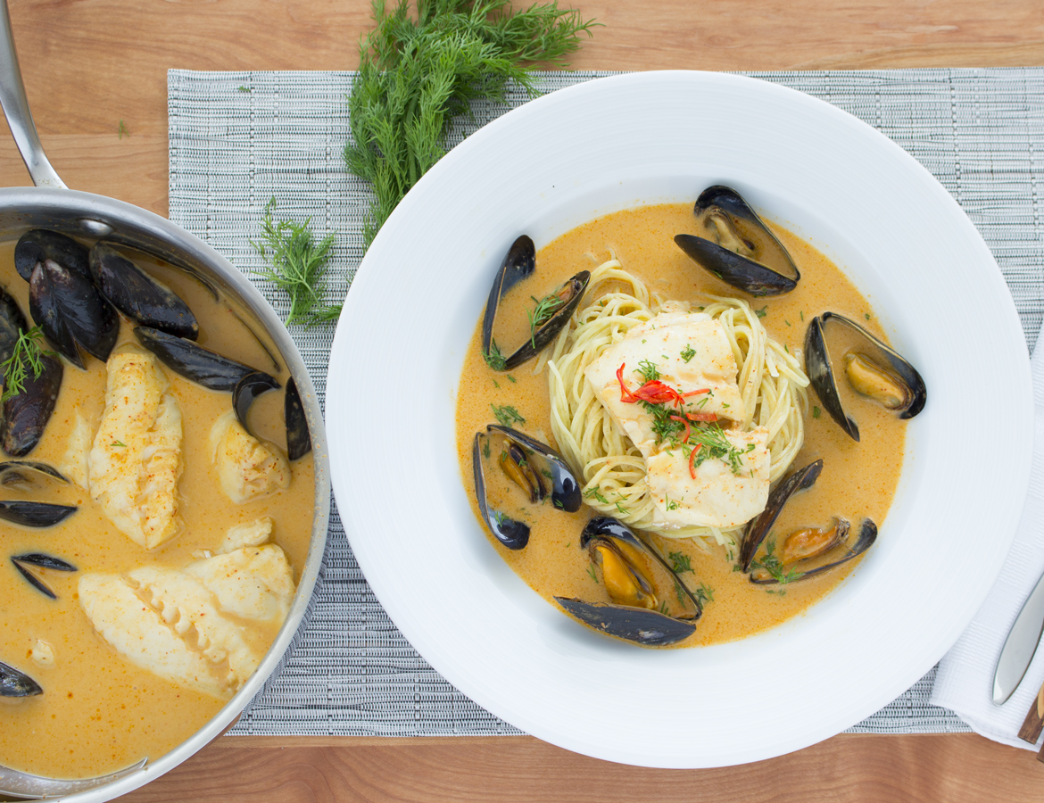 Thai style cod and mussels zuppetta on fresh spaghetti