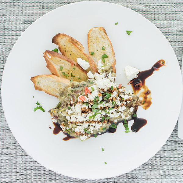 Eggplant and feta salad on olive oil croutons