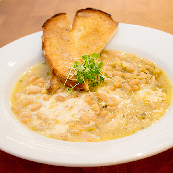 Braised white beans & leeks au gratin