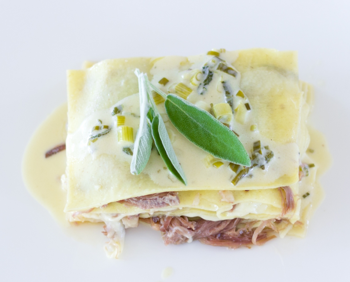 Duck confit and shiitake mushroom lasagna with a creamy white wine fresh sage sauce